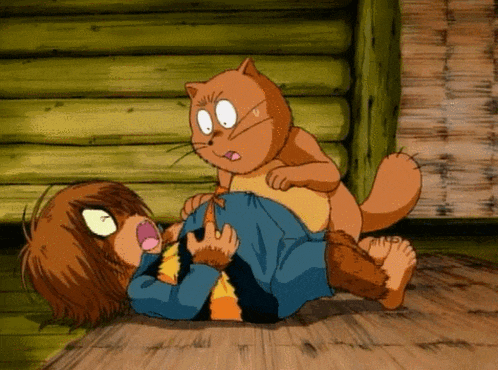 a cartoon character is laying on the floor with a cat on his back