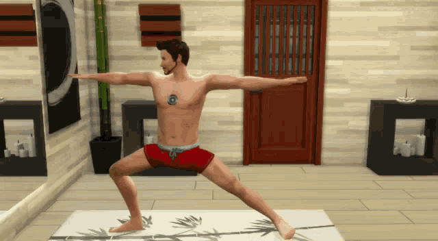 a man without a shirt is doing a yoga pose on a mat