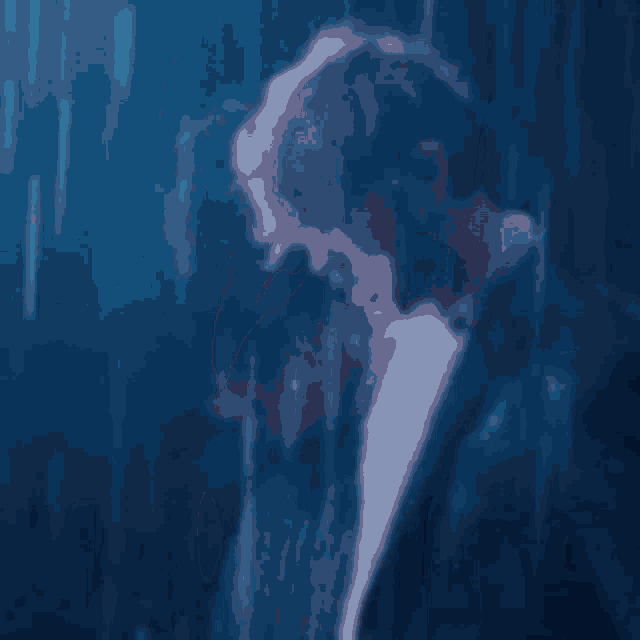 a man in a suit and tie is standing in the rain looking down .