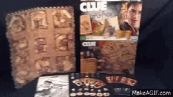 a clue harry potter board game is sitting on a table .