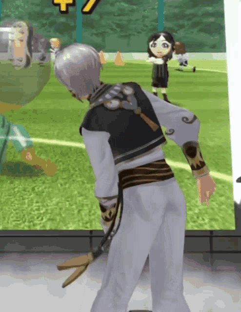 a cartoon character is standing in front of a soccer field with a yellow sign that says 7