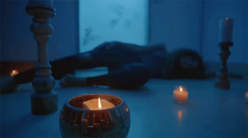 Candle Light Lying Down GIF - Candle Light Lying Down Alone GIFs
