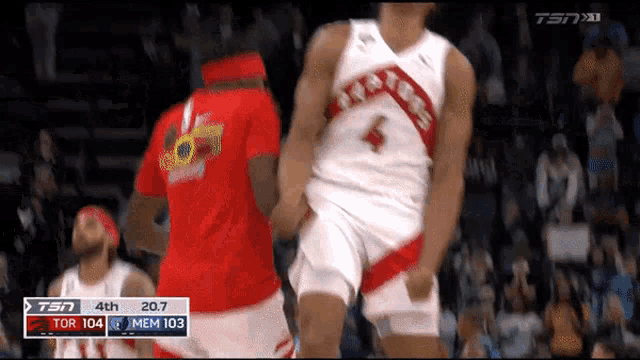 a basketball player in a red shirt with the number 103 on it