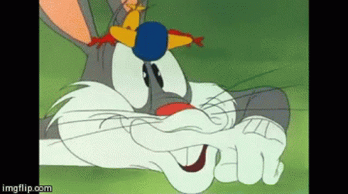 Looney Tunes Bugs Bunny GIF - Looney Tunes Bugs Bunny Flapping Lips With Finger GIFs