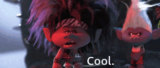 two trolls are standing next to each other and one is wearing a shirt that says cool