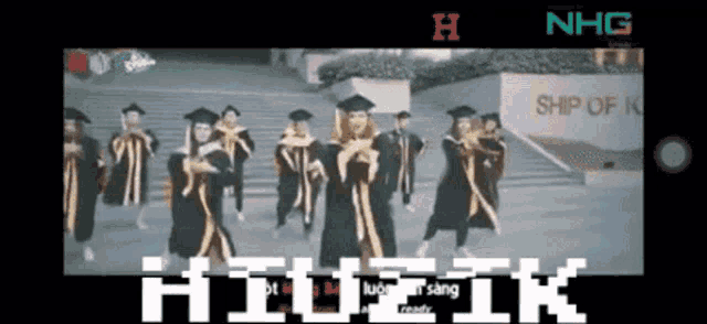 a group of graduates are dancing in front of the ship of korea