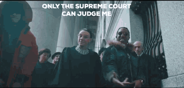 a group of people standing in front of a building with the words " only the supreme court can judge me " above them