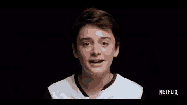 a young man 's face is shown with a netflix logo in the corner