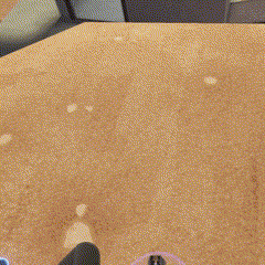a computer generated image of a person standing on a sandy beach