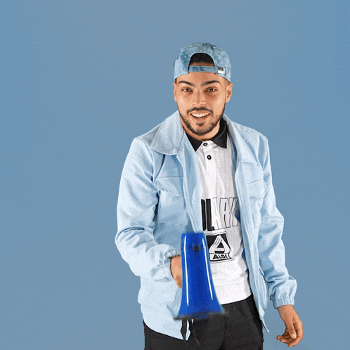 a man is holding a megaphone and the word ratio is behind him