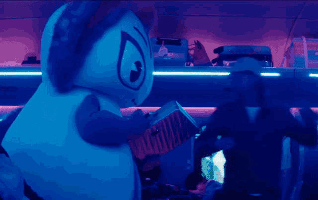 a person in a mascot costume is standing next to a man in a hat