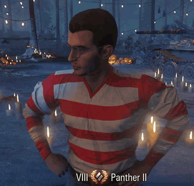 a man wearing a red and white striped shirt with the words viii panther ii on his waist