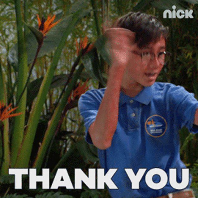 a boy in a blue shirt is waving his hand and the words thank you are behind him