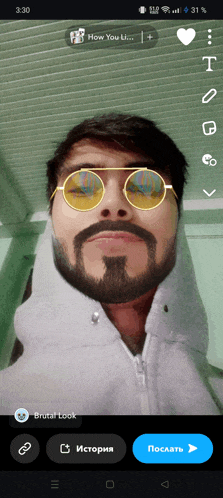 a man with a beard wearing sunglasses and a shark hoodie