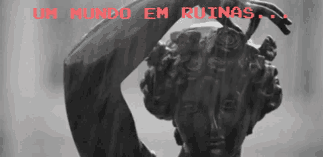a black and white photo of a statue with the words um mundo em ruinas in red