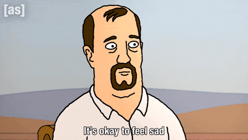 a cartoon of a man with a beard saying it 's okay to feel sad