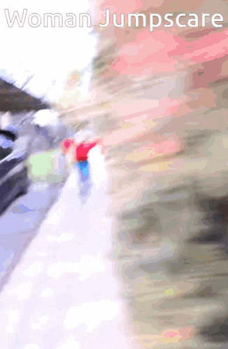 a blurred image of a woman jumpscare logo