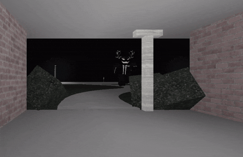 a dark room with a brick wall and a concrete pillar in the middle