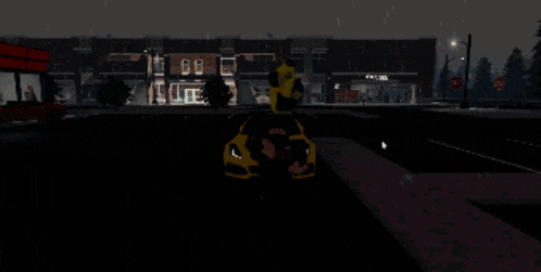 a yellow car is parked on the side of the road in front of a building