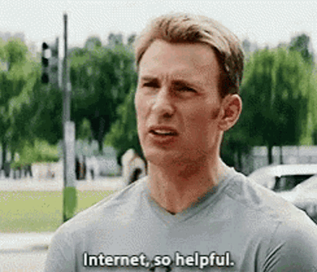 a man in a gray shirt is saying `` internet so helpful '' .