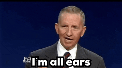 a man says i 'm all ears in front of a blue background