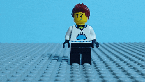 a lego figure is holding his head with the words oh no written below him
