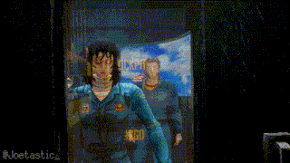 a pixelated image of a woman standing in front of a sign that says ' cockpit '