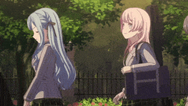 a girl with pink hair is carrying a black bag that says h on it