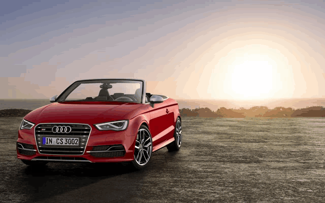 a red audi convertible with the license plate in c53002