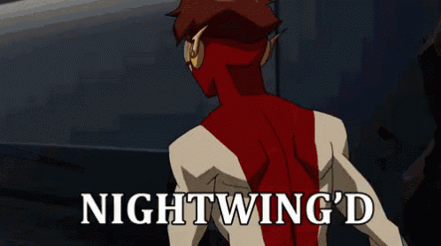 a blurry picture of a superhero with the words nightwing 'd on the bottom