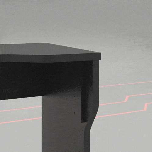 a close up of a black table with a red line behind it