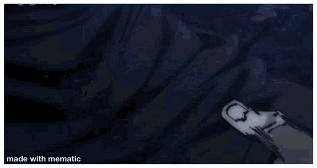 a person is laying on a bed with their hand on their stomach .