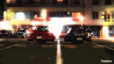 two cars are parked in a parking lot with peaches written on the bottom left