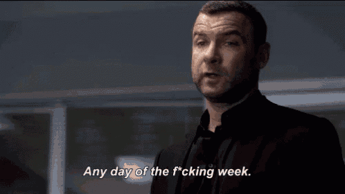 a man in a black suit is saying any day of the fucking week