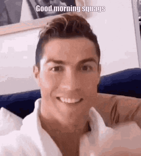 a close up of a man 's face with the caption `` good morning squags '' .
