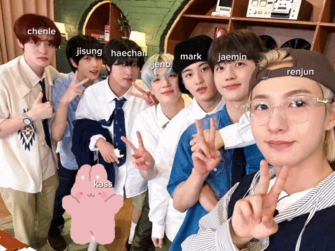 a group of young men posing for a picture with the names chenle jisung haechan mark jaemin jeno and renjun