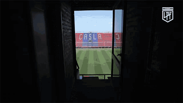 a view of a soccer field with casla written on the side