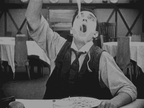 Buster Keaton Spaghetti GIF - Buster Keaton Spaghetti Playing With Food GIFs