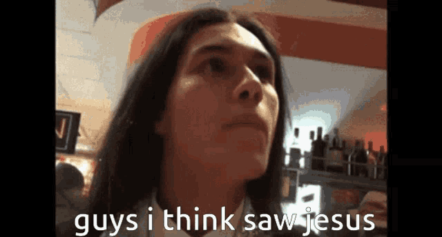 a man with long hair says " guys i think sawjesus "