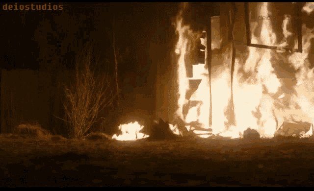 a screen shot of a burning building with the words deiostudios written above it