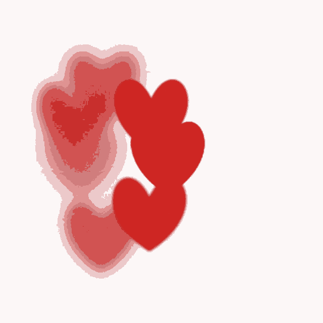 the hearts are blurred and floating in the air on a white background .