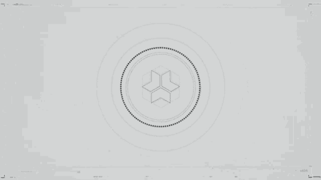 it looks like a circle with a cube in the middle of it .