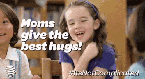 a little girl is laughing with the words moms give the best hugs behind her