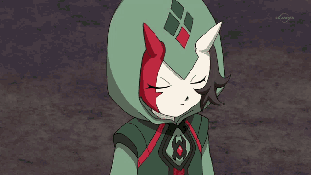 a cartoon character with a green hood and red eyes is on a tv screen that says bs japan