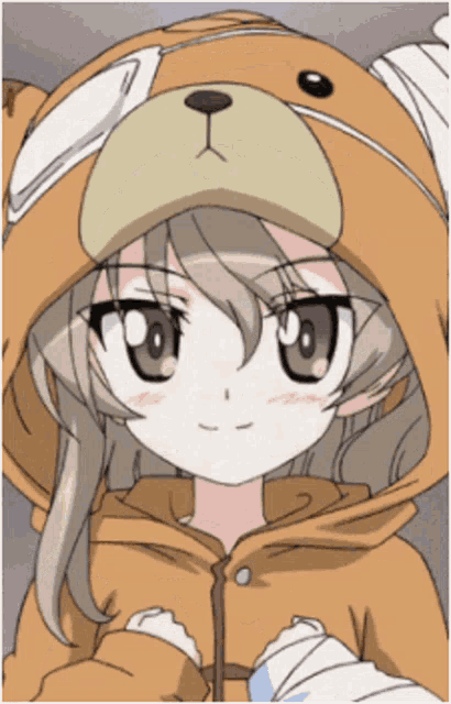 a girl with glasses and a teddy bear hood