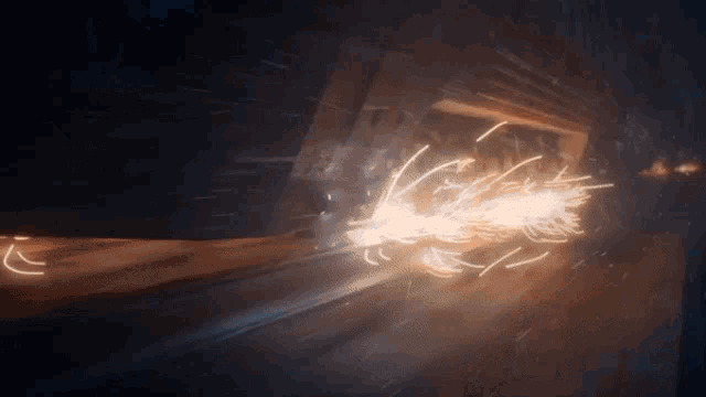 a blurred image of a light coming out of a tunnel