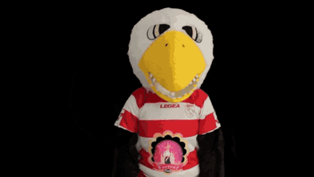 a mascot wearing a red and white striped shirt with the word lega on it