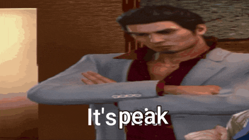 a man in a suit says it 's speak while standing with his arms crossed