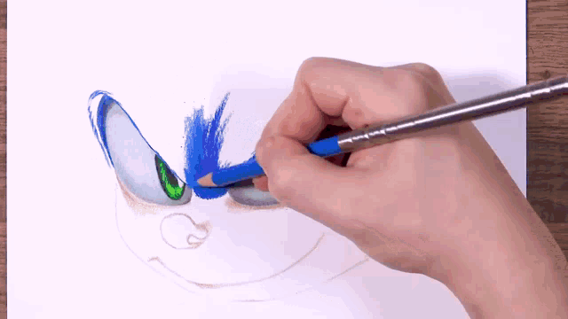 a person is drawing a face with a blue pencil