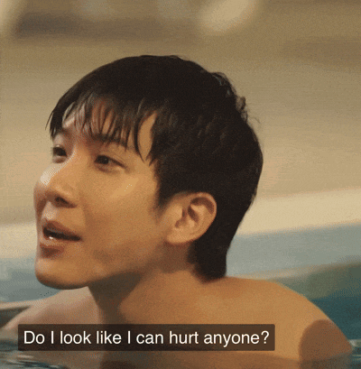 a man in a bathtub with the words " do i look like i can hurt anyone " below him